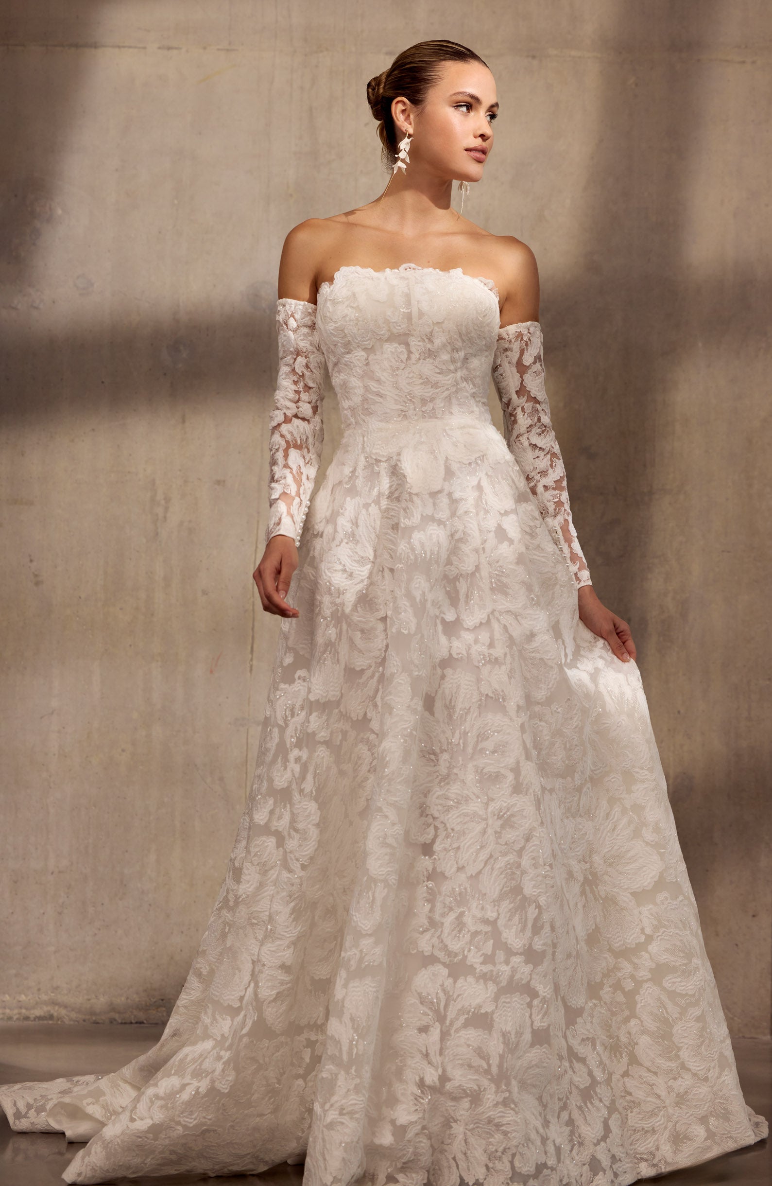 Georgette crepe sheath dress with floral
applique, optional sleeves and illusion train