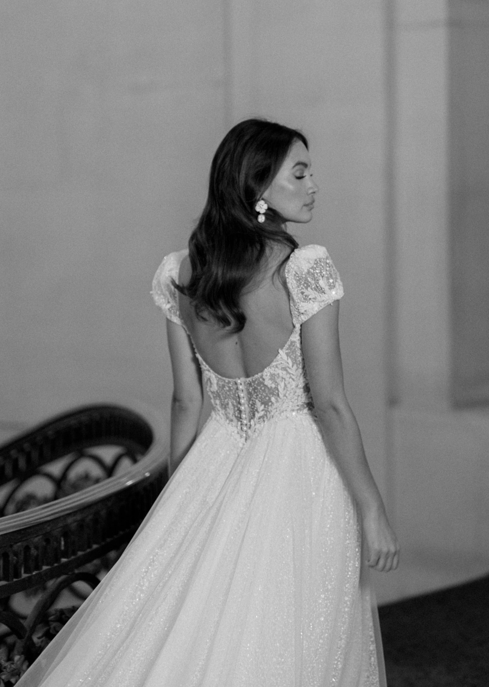 Chic sparkly A-line scoop neckline with illusion tulle cut-out with corset and detachable sleeves