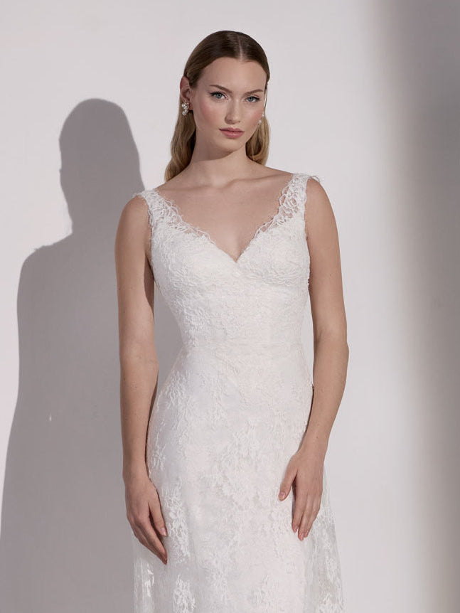 French-look lace slip over satin sheath with flower buttons