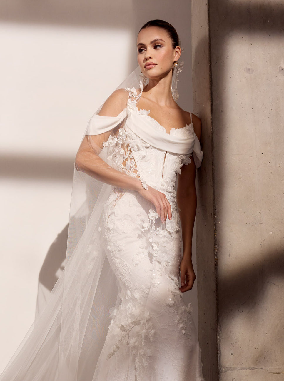 3D floral applique lace and georgette sheath
dress with detachable drape and pull-up
sleeves
