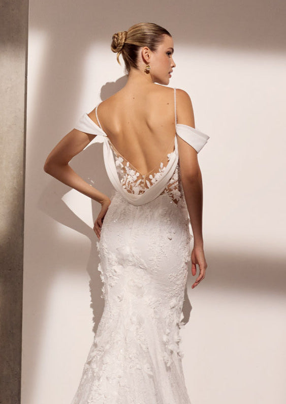 3D floral applique lace and georgette sheath
dress with detachable drape and pull-up
sleeves
