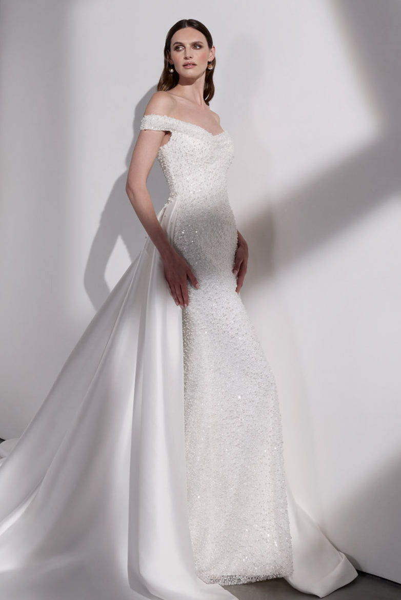 Pearl beaded sheath dress with detachable
mikado overskirt