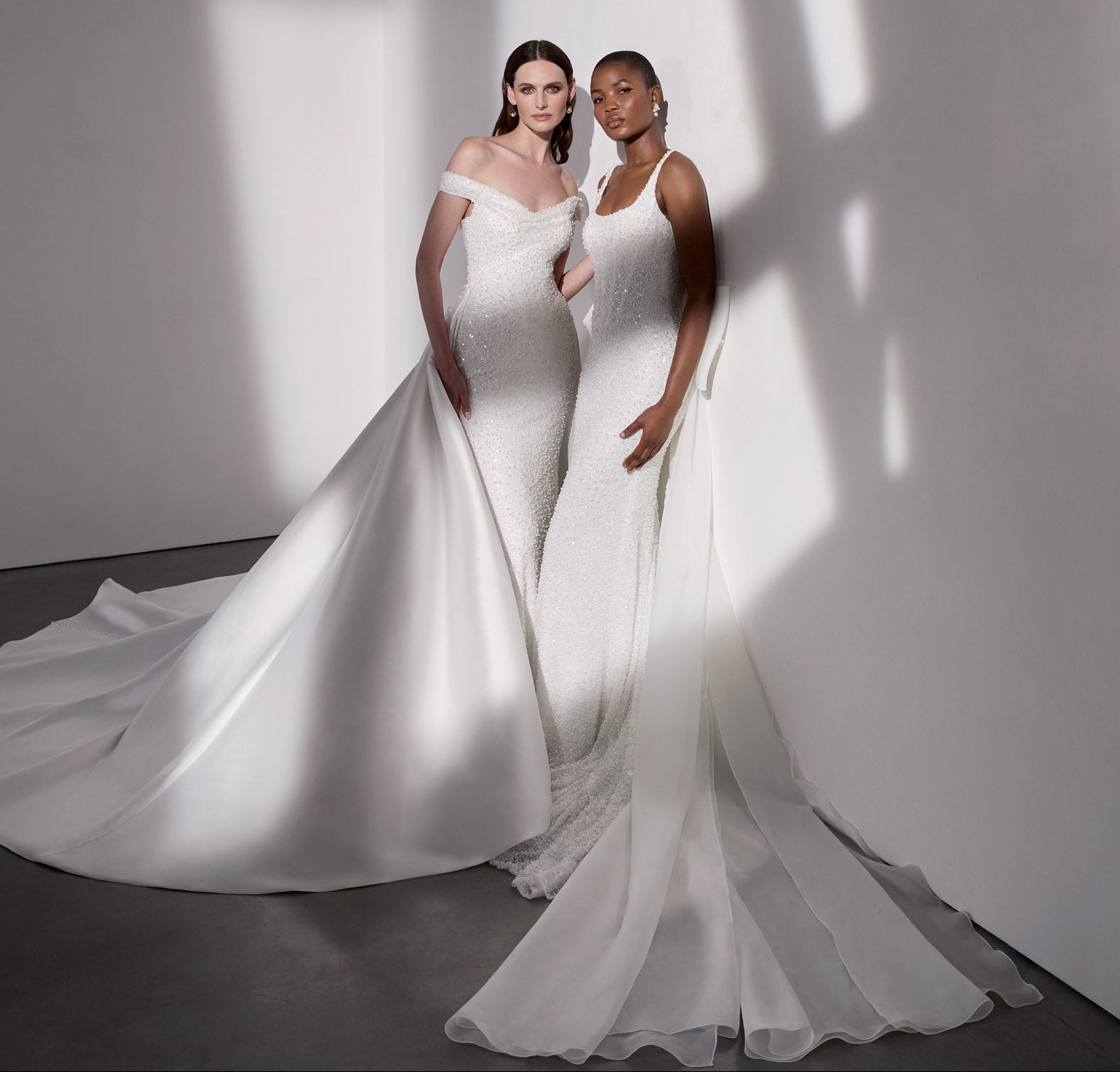 Pearl beaded sheath dress with detachable
mikado overskirt