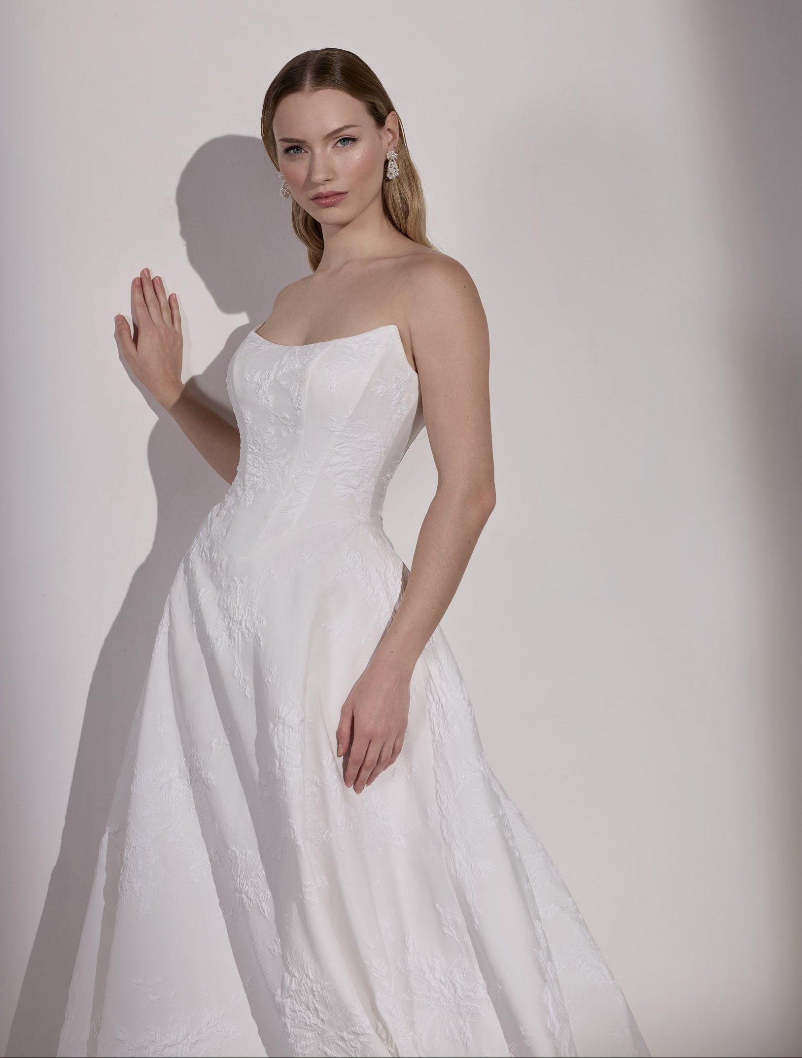 Embossed jacquard basque waist A-Line with
lace-up back and detachable flower