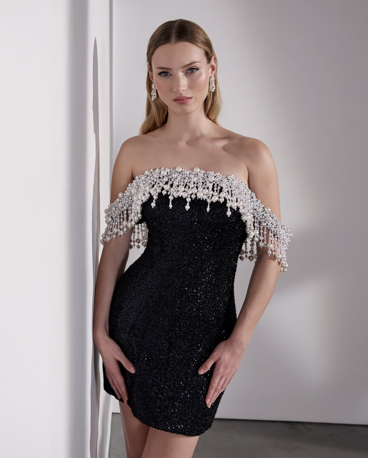 Stylish off-the-shoulder pearl neckline and jacquard mini dress