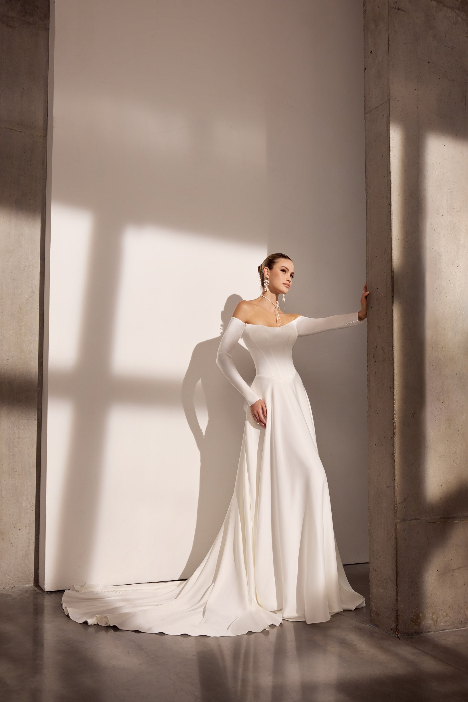 Off-the-shoulder Japanese crepe A-Line basque waist
dress with sleeves and button detail