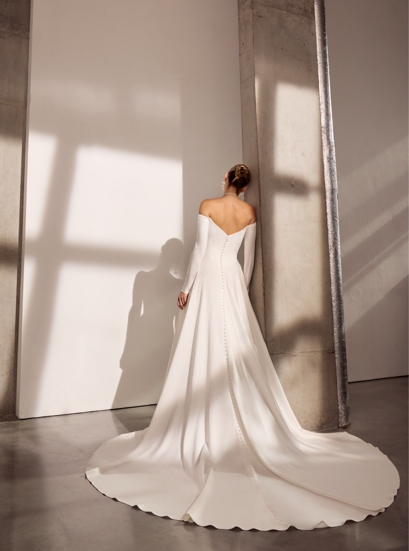 Off-the-shoulder Japanese crepe A-Line basque waist
dress with sleeves and button detail