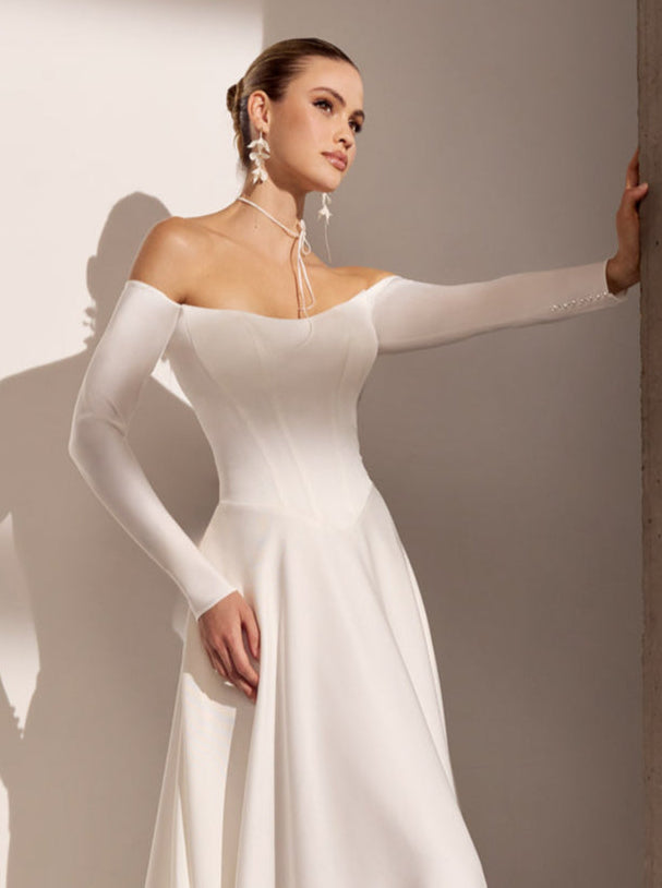 Off-the-shoulder Japanese crepe A-Line basque waist
dress with sleeves and button detail