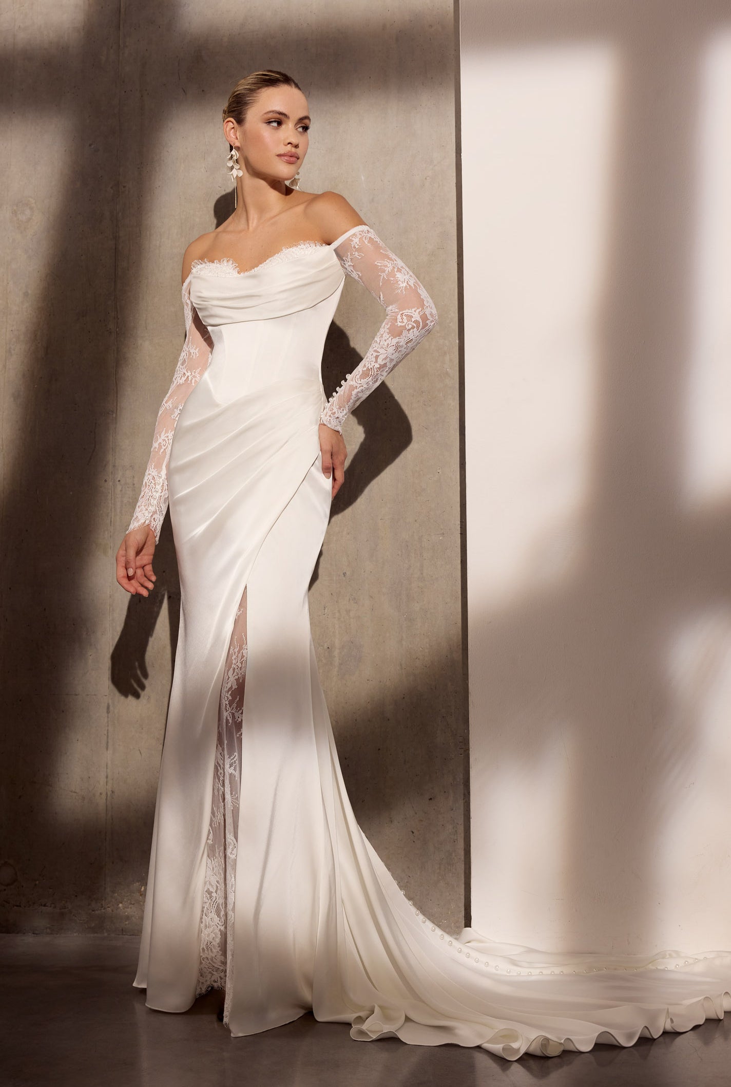 Stretch satin and chantilly tulle sheath dress
with lace sleeves and skirt slit