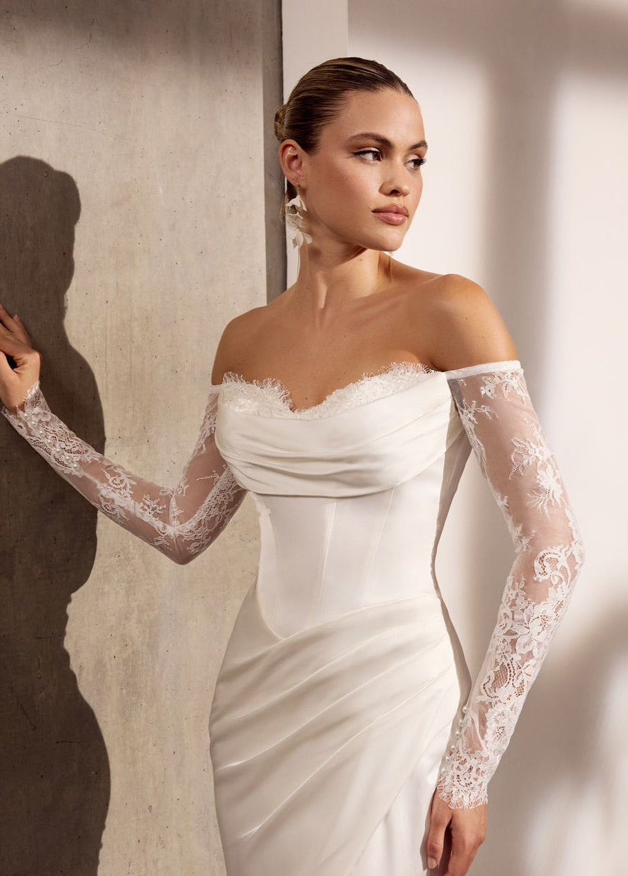 Stretch satin and chantilly tulle sheath dress
with lace sleeves and skirt slit