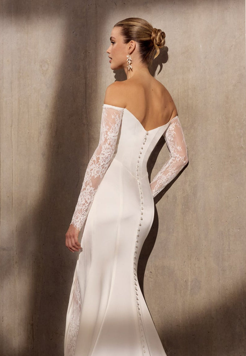 Stretch satin and chantilly tulle sheath dress
with lace sleeves and skirt slit