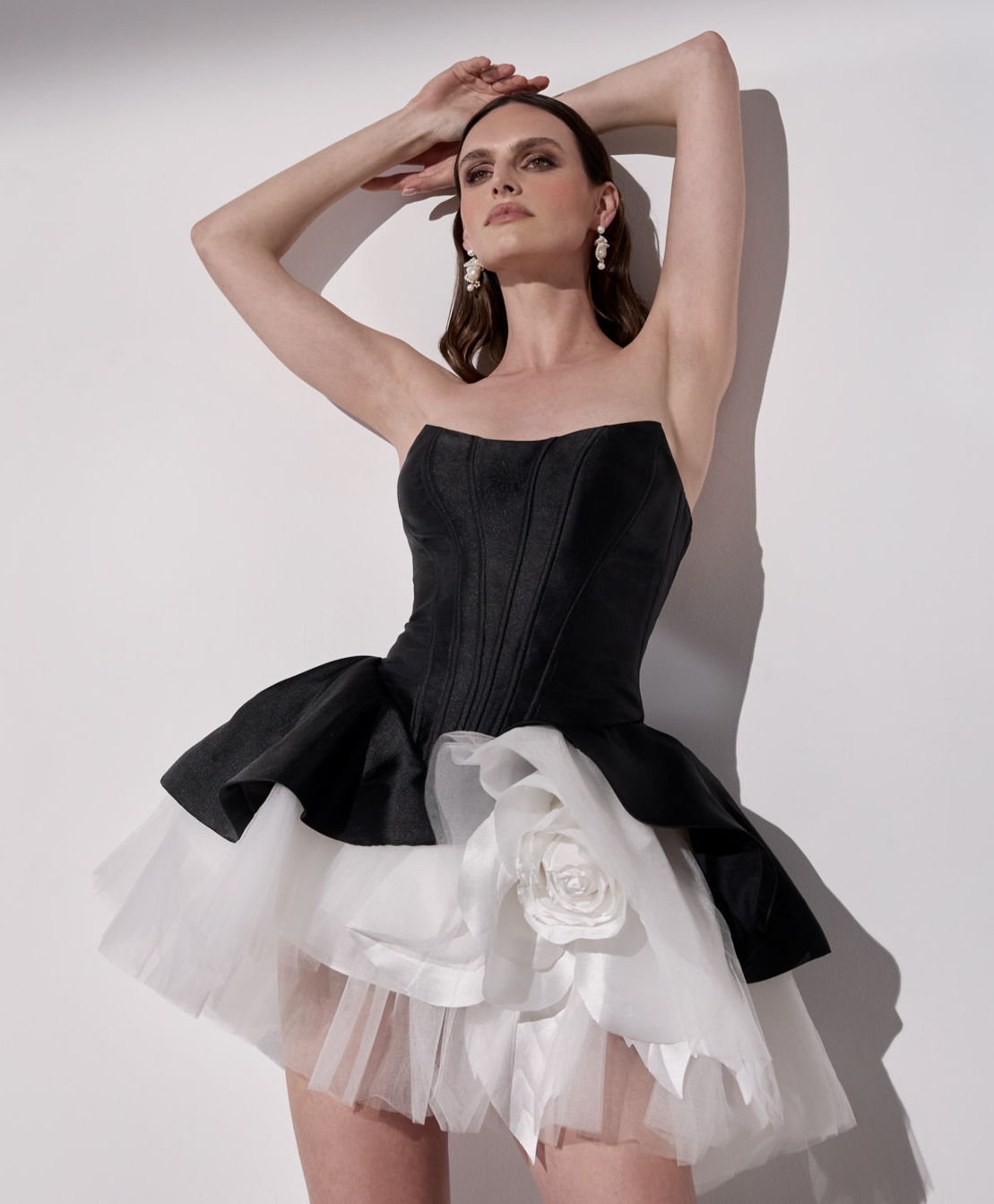 Lux mikado strapless cateye basque waist and puff mini skirt
with flower