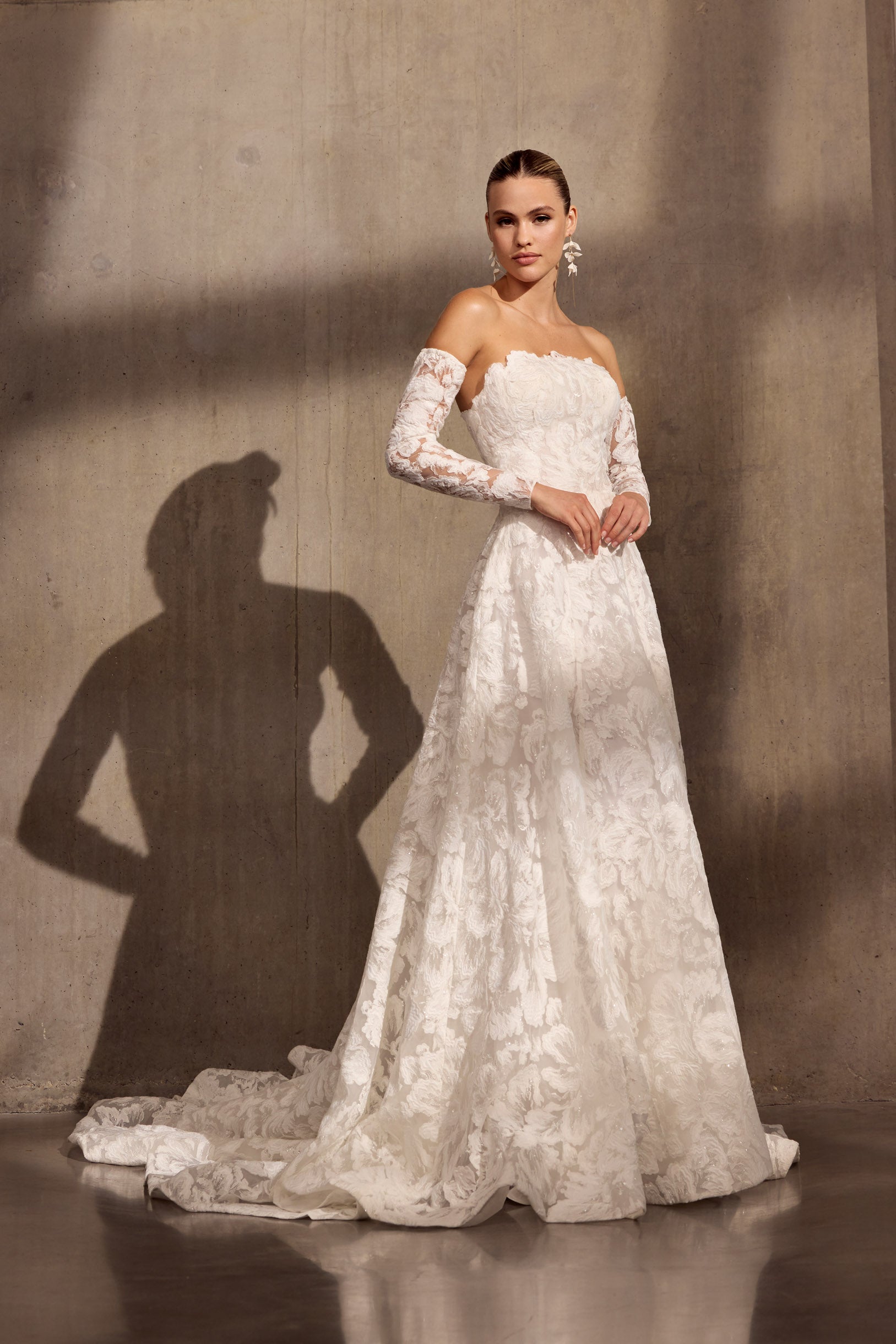 Georgette crepe sheath dress with floral
applique, optional sleeves and illusion train