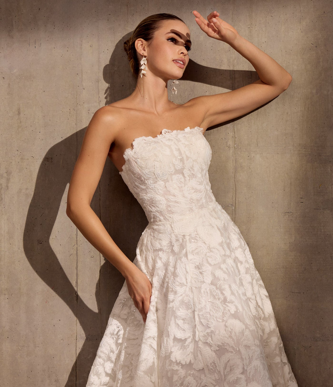 Georgette crepe sheath dress with floral
applique, optional sleeves and illusion train