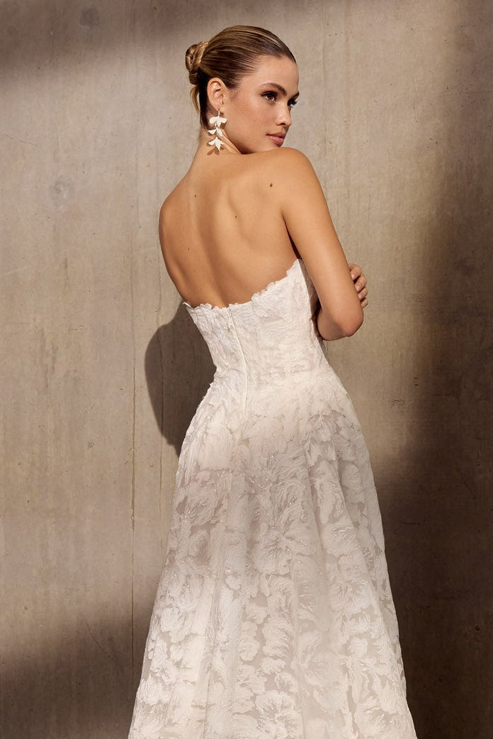 Georgette crepe sheath dress with floral
applique, optional sleeves and illusion train