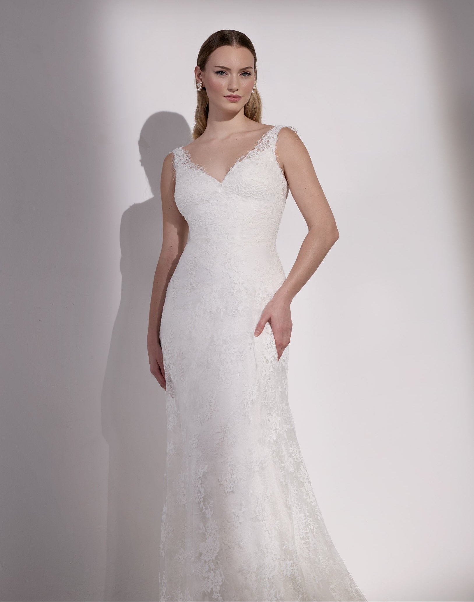 French-look lace slip over satin sheath with flower buttons