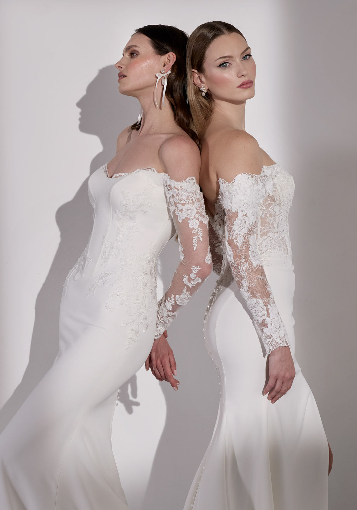 Lux stretch crepe with embroidery lace detail
and illusion train