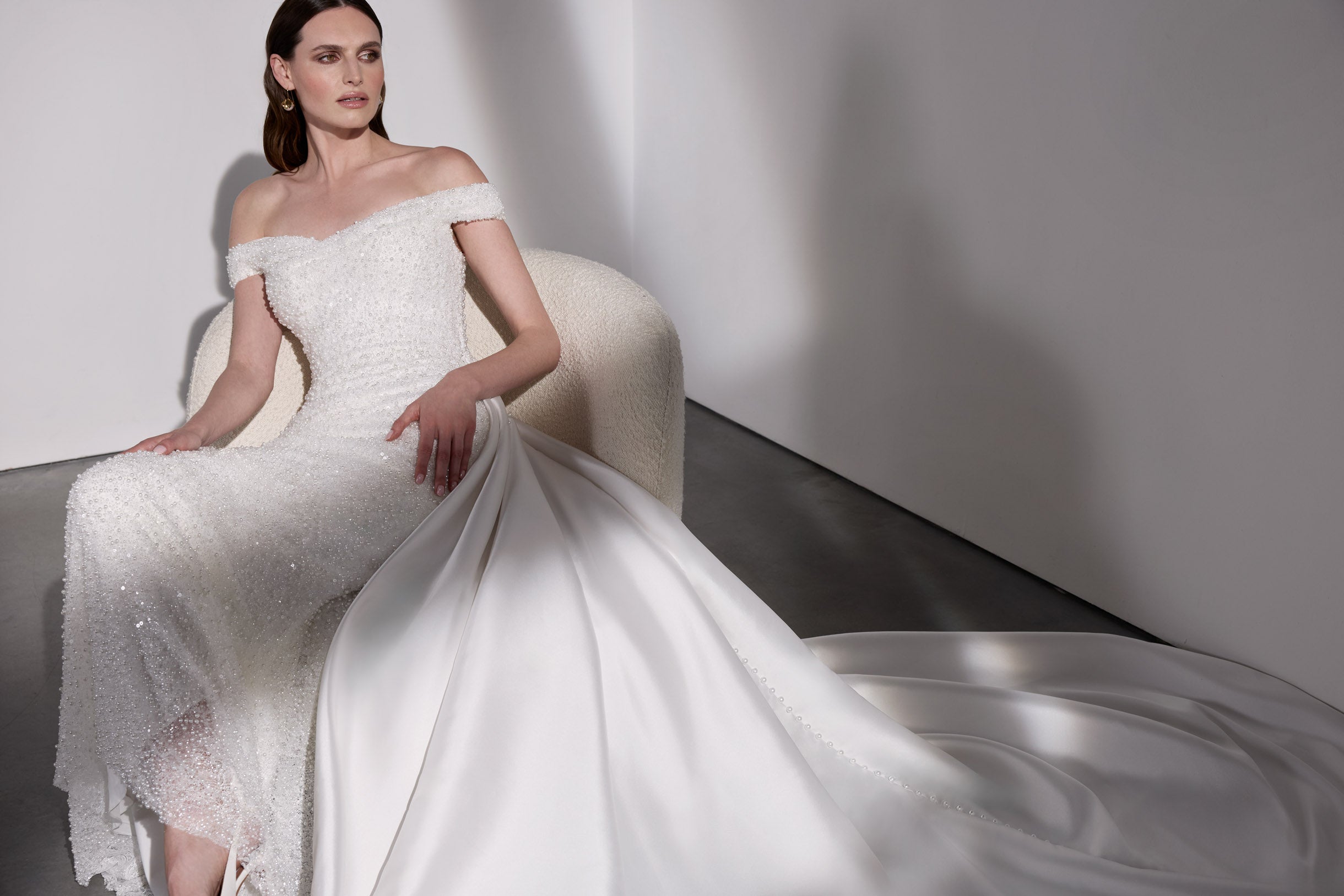 Pearl beaded sheath dress with detachable
mikado overskirt
