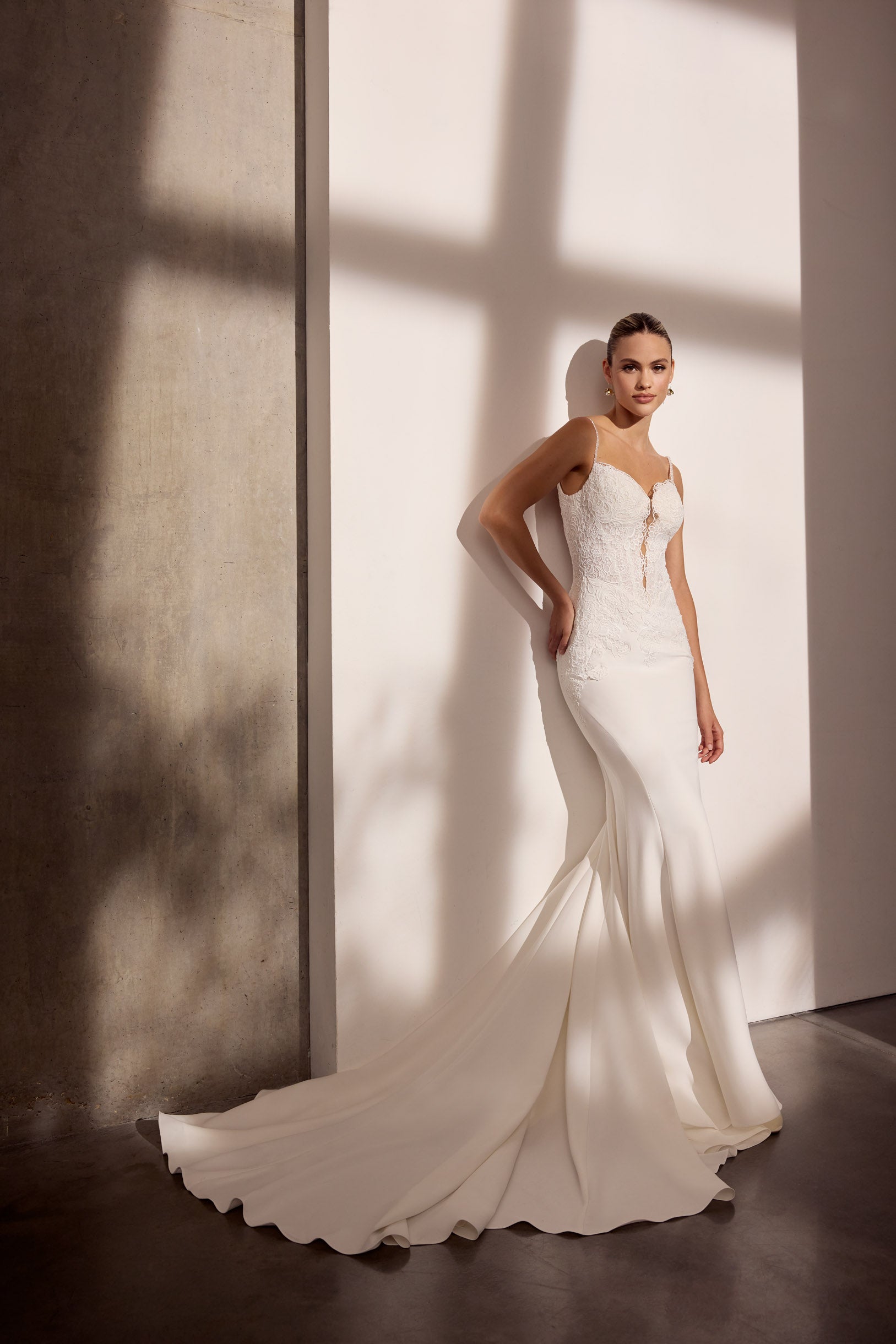 Lace and lux stretch crepe sheath dress with
lace-up back