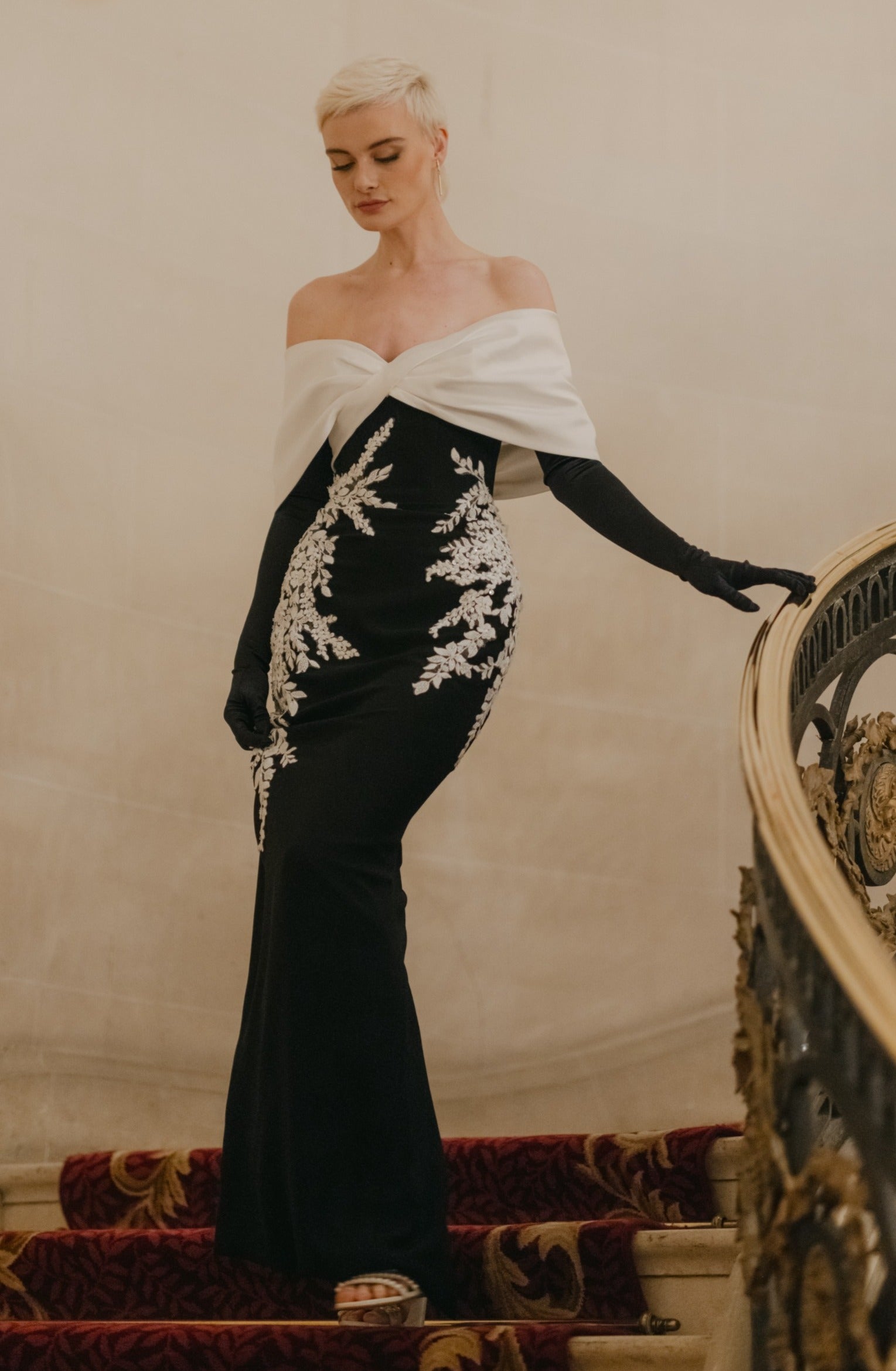 off the shoulder bow detail monochrome column dress with lace applique with gloves