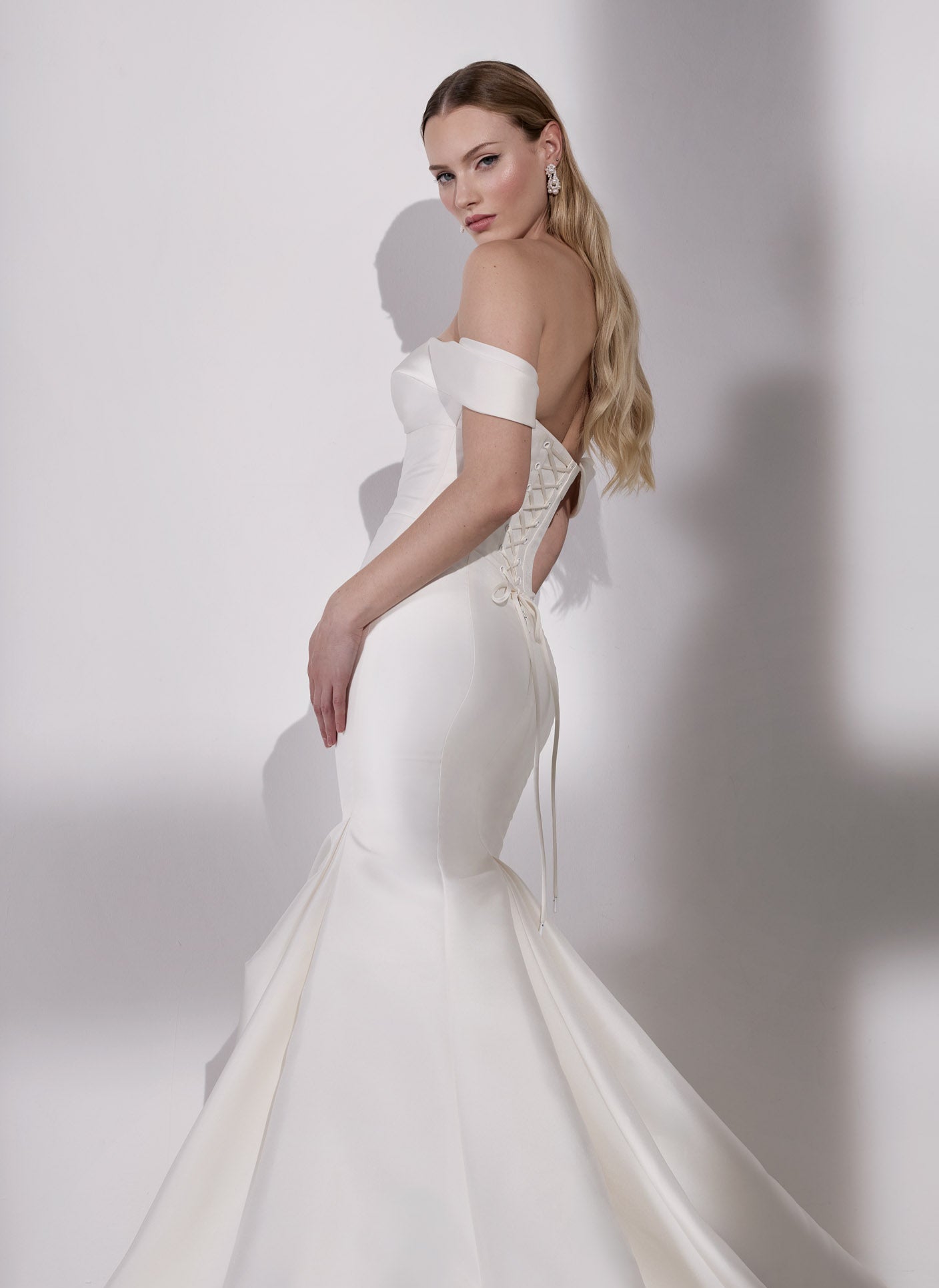 Iredescent Japanese mikado fishtail dress
with detachable straps and lace-up back